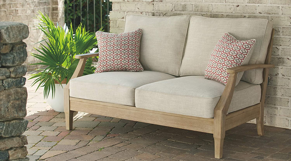 Signature Design by Ashley Clare View Coastal Outdoor Patio Eucalyptus Loveseat with Cushions, Beige